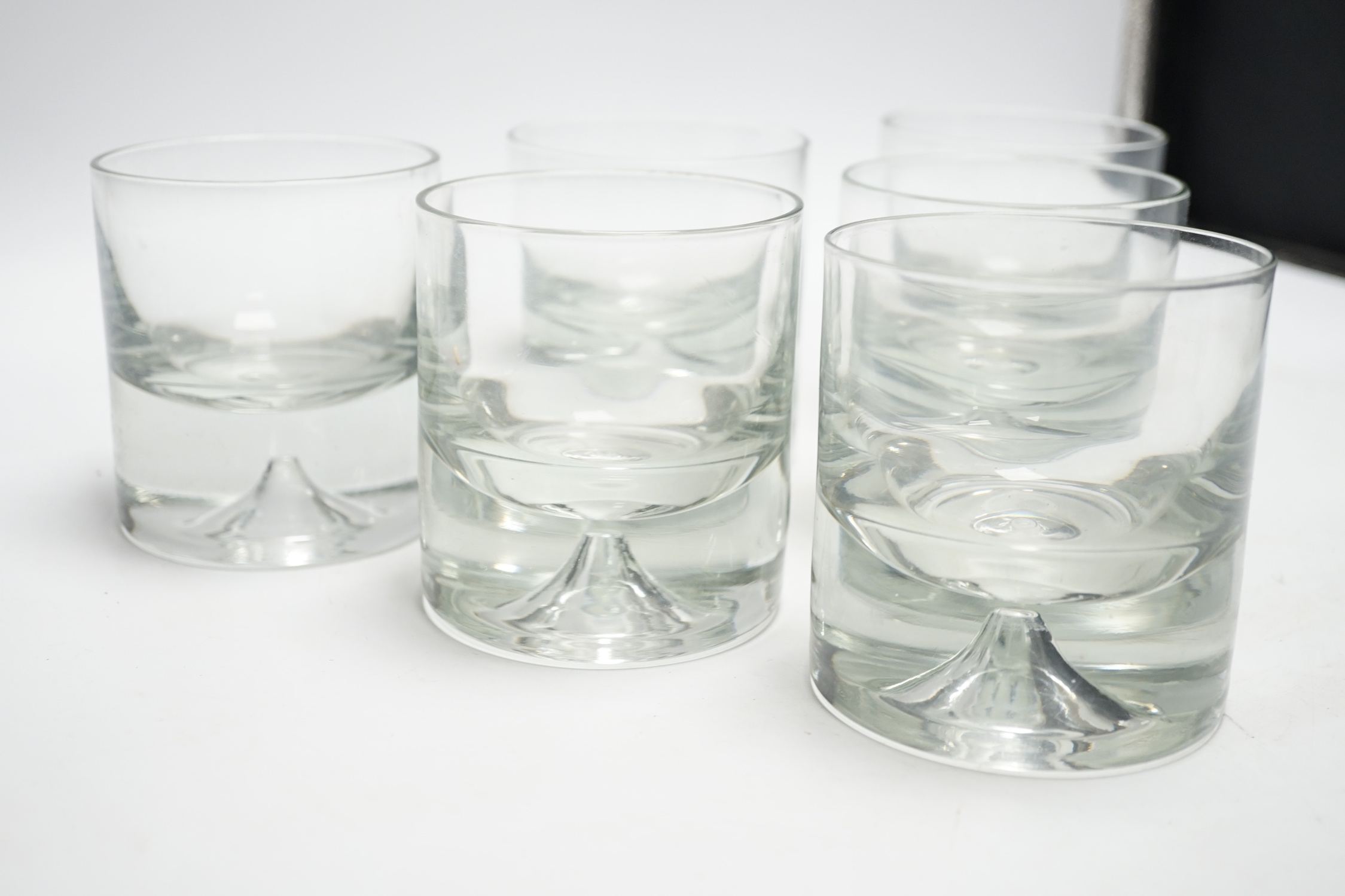 A set of six plain crystal glass tumblers